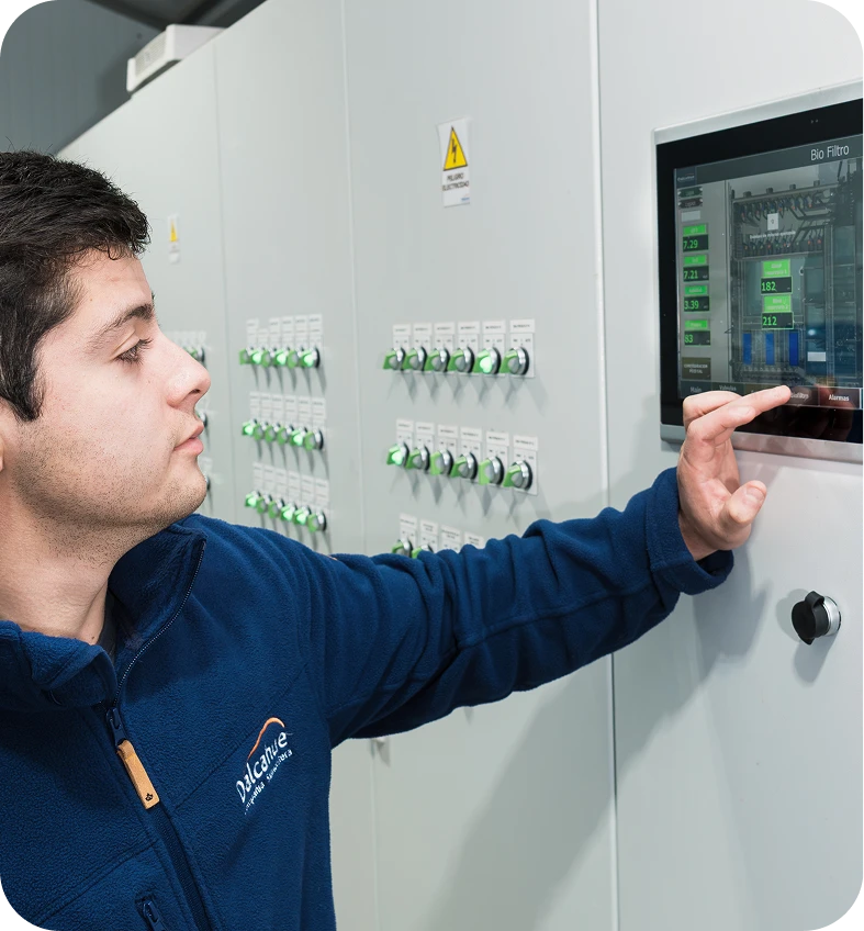 Operator adjusting the biofilter on a touchscreen control panel