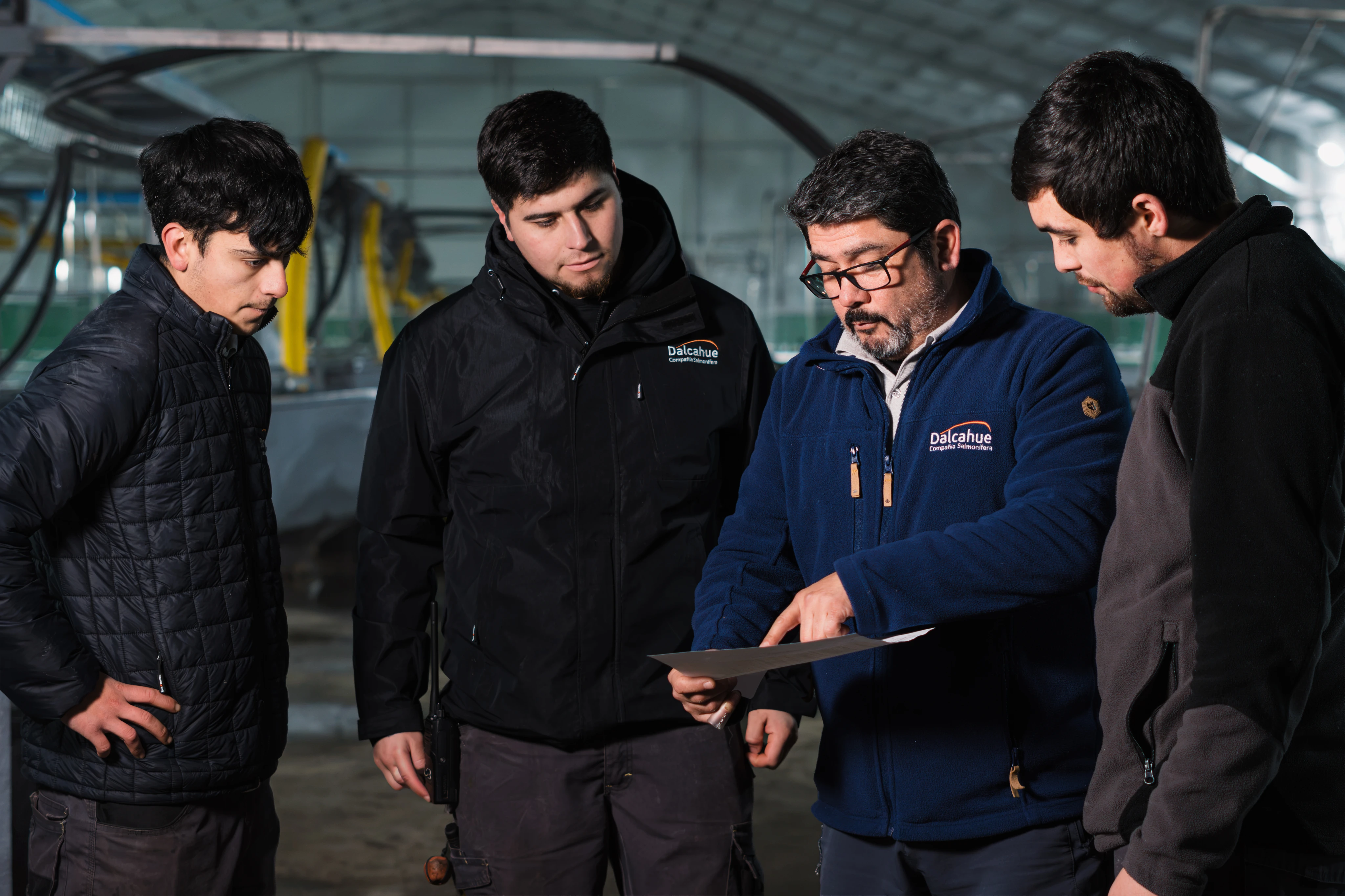 The Salmonífera Dalcahue team reviewing documentation on site